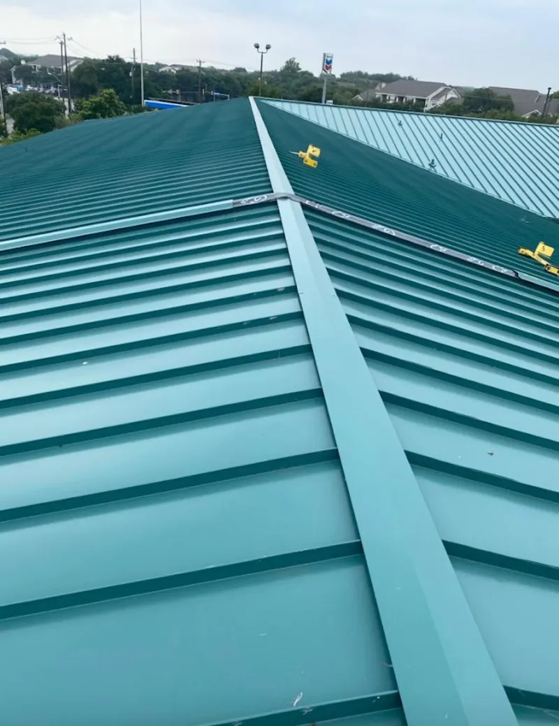 Green commercial metal roof ridge and valley for Metal Roof Repair in North Lakes