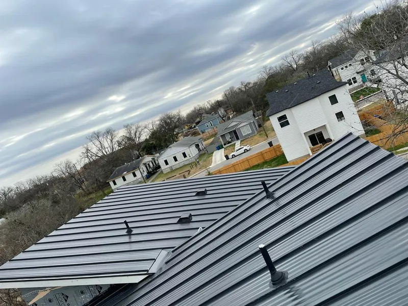 Standing seam metal roof panels with vents for Skylight Repair in North Lakes
